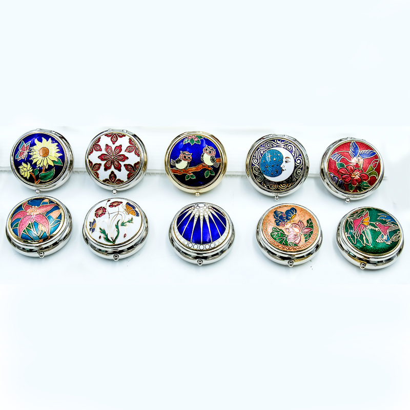 Small round-shaped enamel pillbox